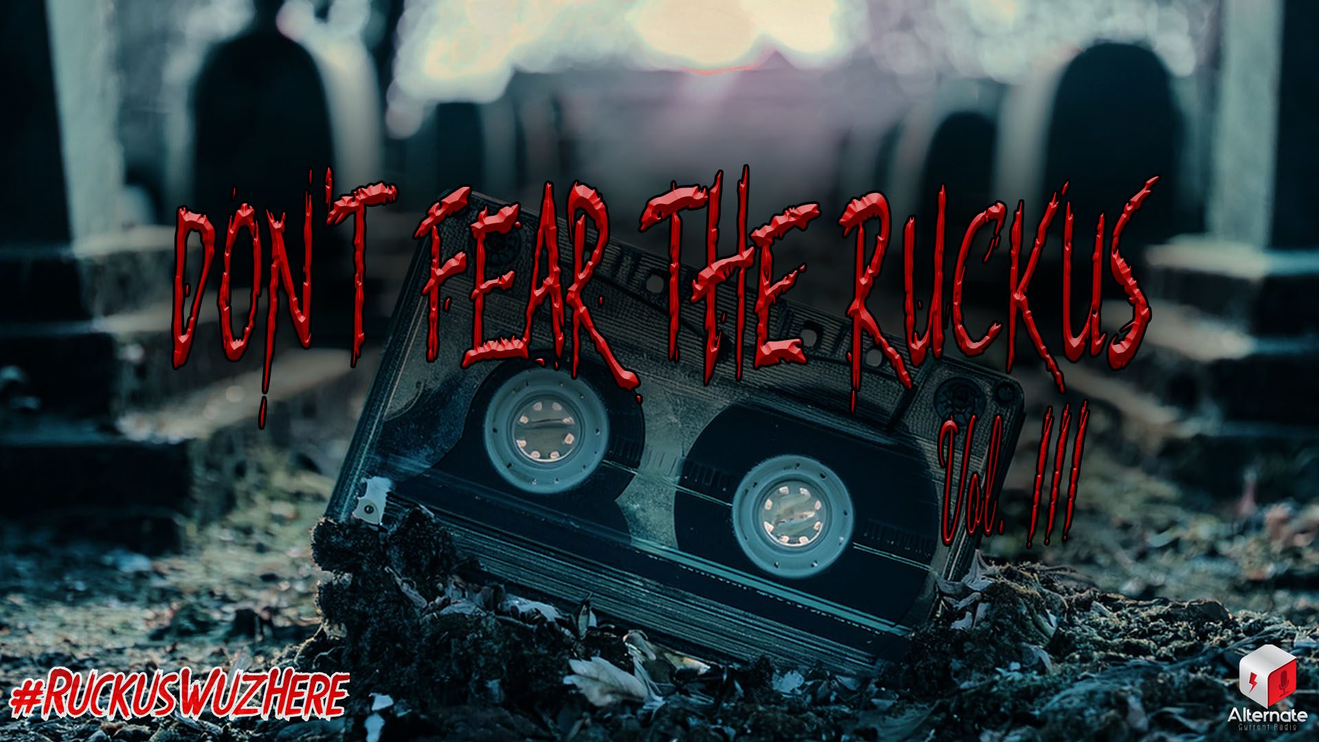 RuckusWuzHere: Don’t Fear The Ruckus Vol. 3 A partially buried audio cassette tape lies in the dirt of a shadowy graveyard, surrounded by tombstones and leafless trees under a gloomy, clouded sky.